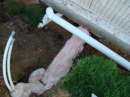 Insulated connecting pipes to the solar heat storage tank which will be about 30 ft north of the house in its own shed.