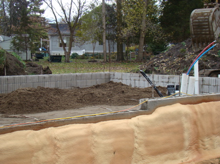 Starting to fill the garage foundation.