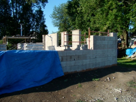 Looking across the north wall at the west wall and scaffolds in place.